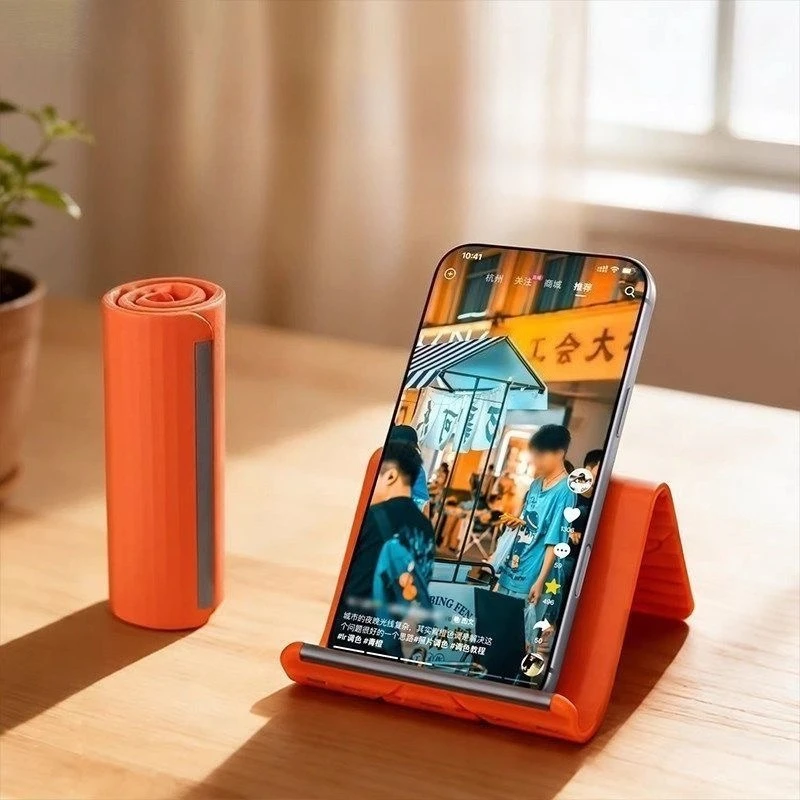 Standing Desk - ขาตั้งโทรศัพท์มือถือและแท็บเล็ตซิลิโคนแบบพกพา ดีไซน์สร้างสรรค์ ยืดหยุ่น พับเก็บได้ ปรับเปลี่ยนรูปแบบได้ สำหรับเดินทางและสำนักงาน